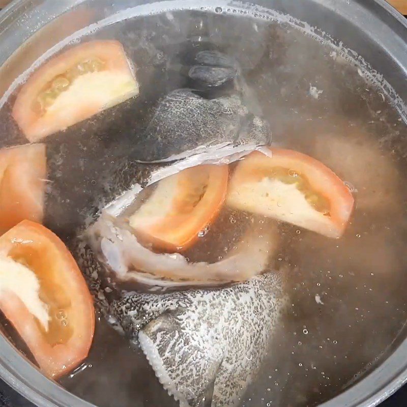 Step 3 Cooking soup Grouper fish soup with bamboo flowers