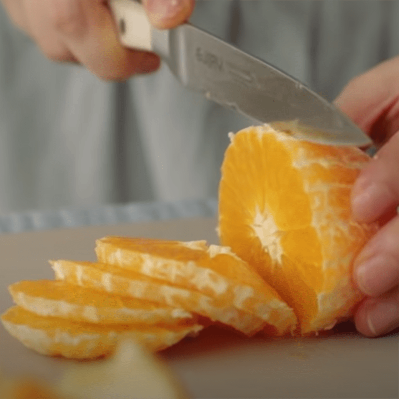 Step 4 Slicing the oranges Fresh orange cookies