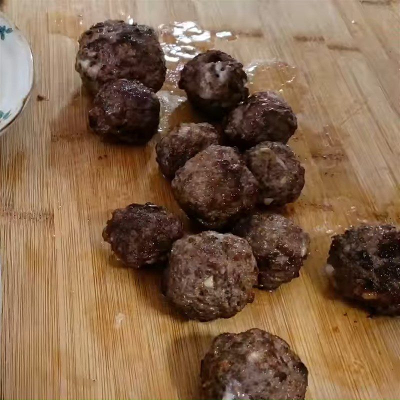 Step 3 Fry the meatballs for the first time for Fried Meatballs Wrapped in Cheese