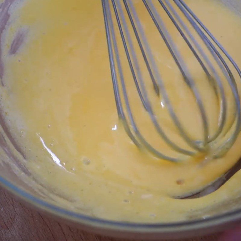 Step 2 Whisking egg yolks with sugar for white chocolate creme brulee