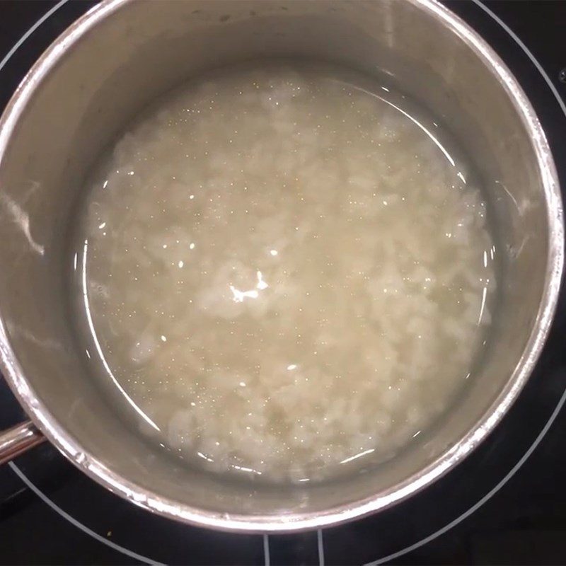 Step 3 Cook the porridge for Frog Porridge with Water Spinach