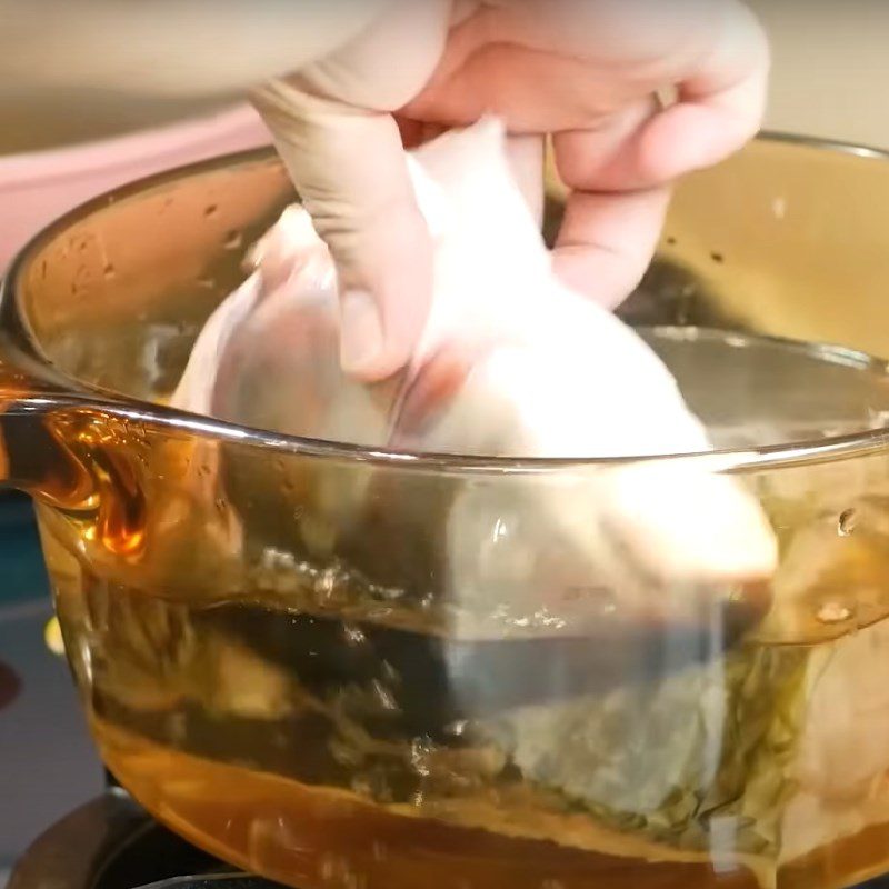 Step 3 Cooking fish head for sour fish soup Northern style