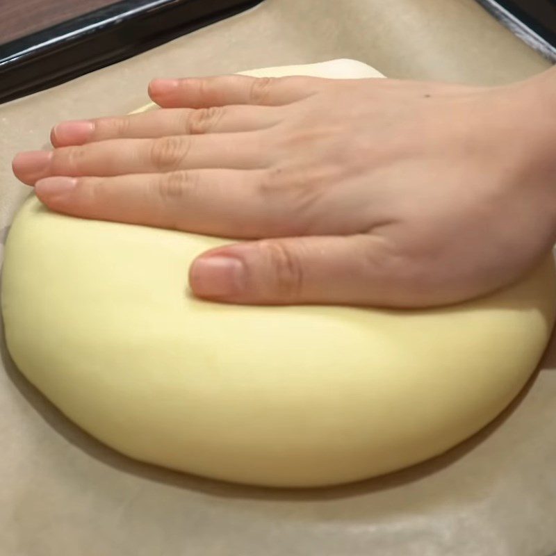 Step 4 Spread garlic butter and sprinkle cheese Garlic bread with cheese