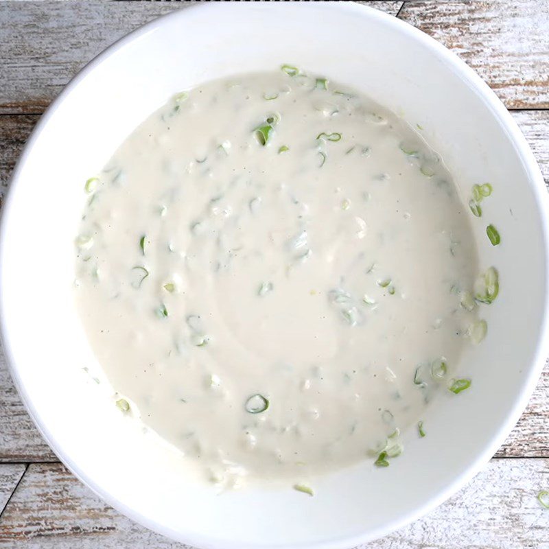 Step 1 Mix the batter for Fried egg cake with cheese and green onion rolls