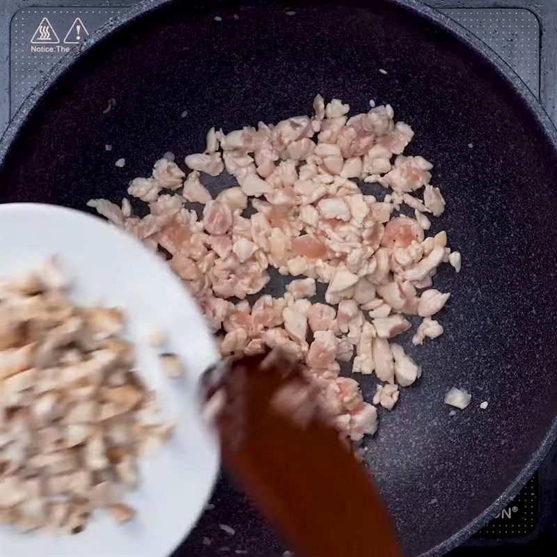 Step 2 Stir-fry chicken breast and mushrooms for Chicken Breast Oatmeal Soup