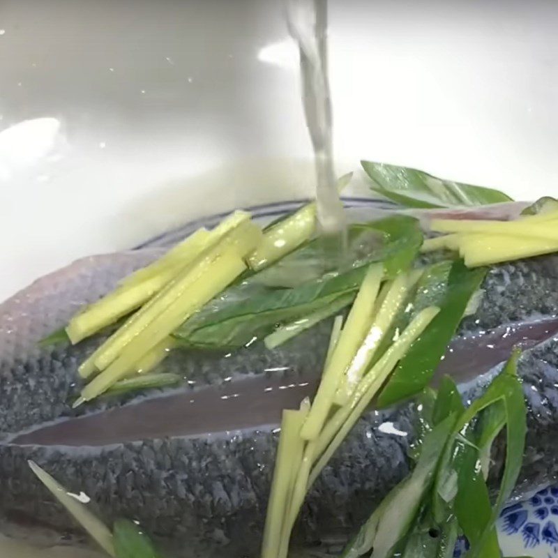 Step 3 Marinate the fish Steamed striped bass with soy sauce