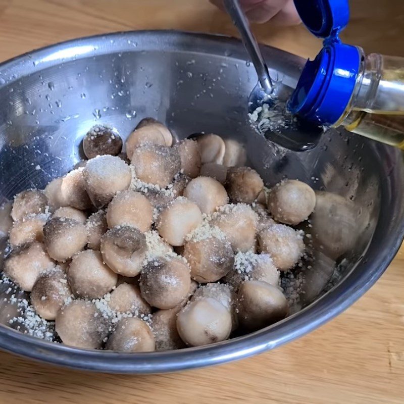 Step 2 Marinate the mushrooms Straw mushrooms cooked with pepper