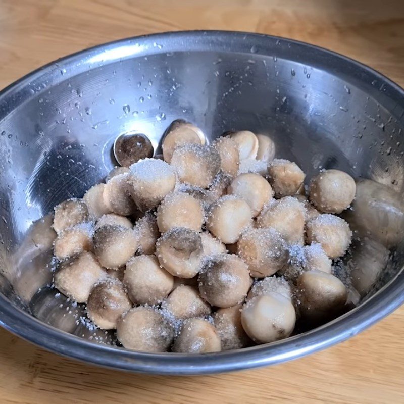 Step 2 Marinate the mushrooms Straw mushrooms cooked with pepper