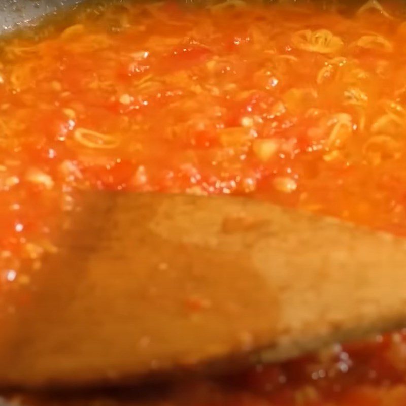 Step 4 Sautéing tomatoes for color in Northern style sour fish soup