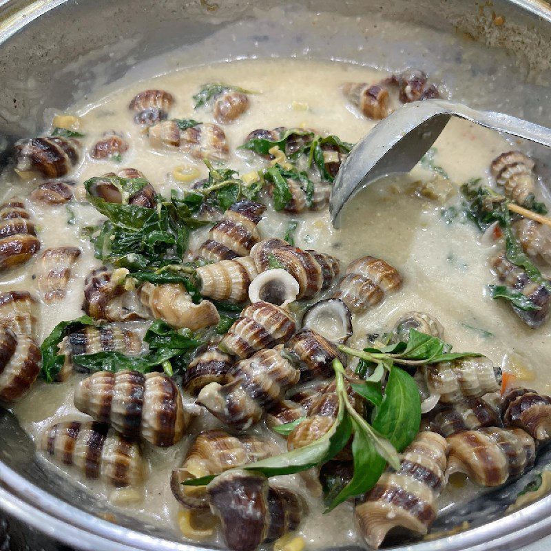 Step 4 Stir-fried snails with coconut