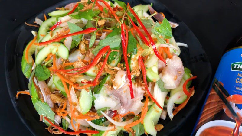 Cucumber salad with pig's ear