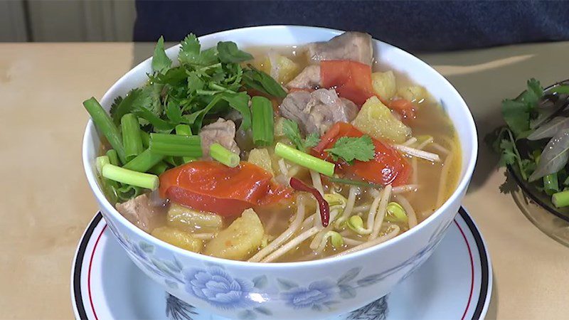 Sour rib soup with pineapple