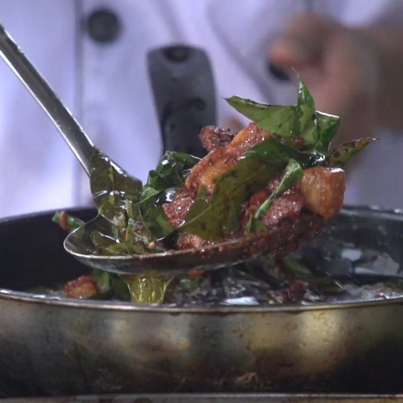 Step 4 Frying pork belly with moc mat leaves