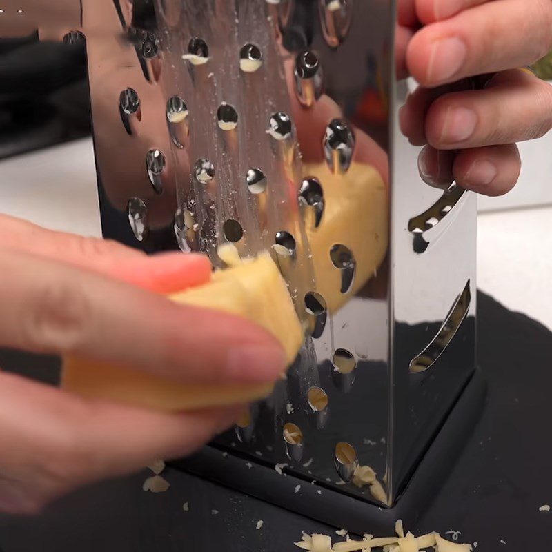 Step 3 Grate and mix cheese with beef for minced beef sandwich