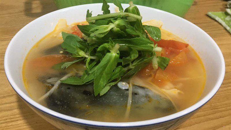 Sour bamboo shoot soup with salmon