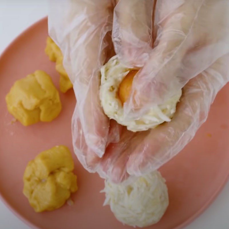 Step 2 Rolling the dough and wrapping the filling Mooncake with durian coconut filling using an air fryer