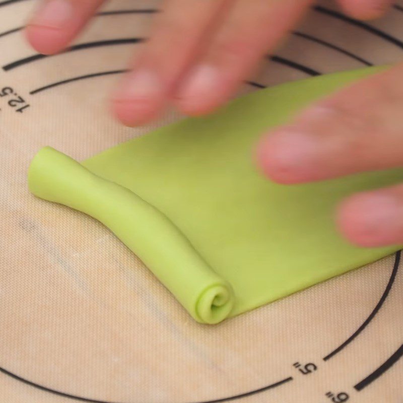 Step 5 Rolling the dough and wrapping the butter filling Butter bun