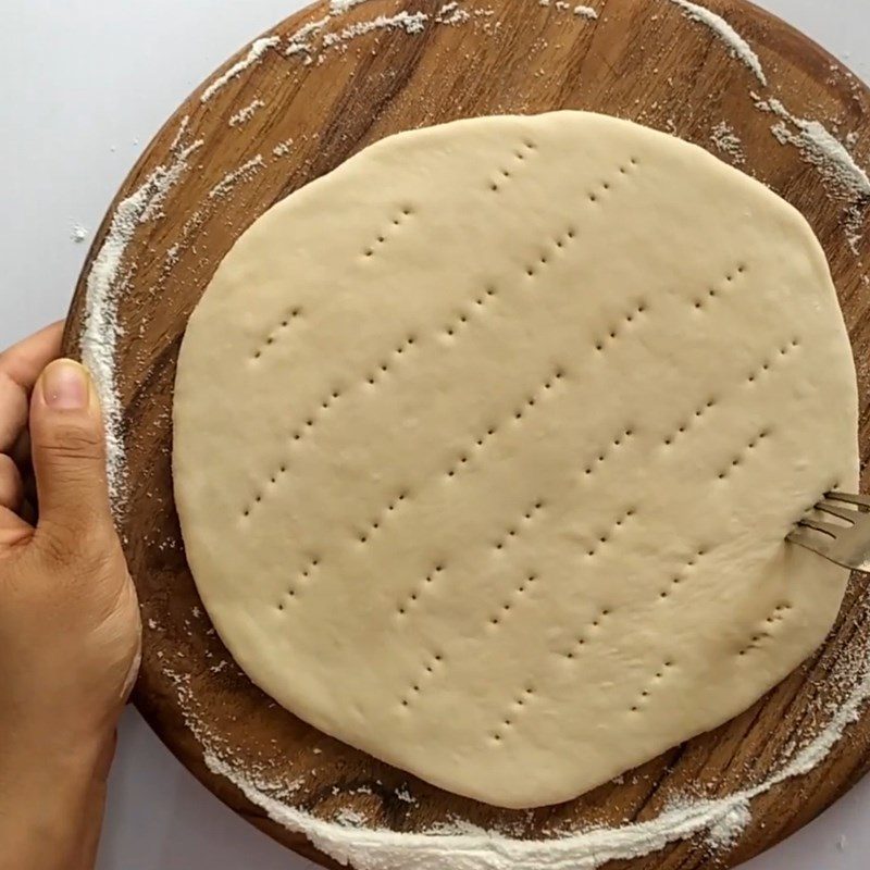 Step 4 Roll out the dough and fill the pizza Mango pizza