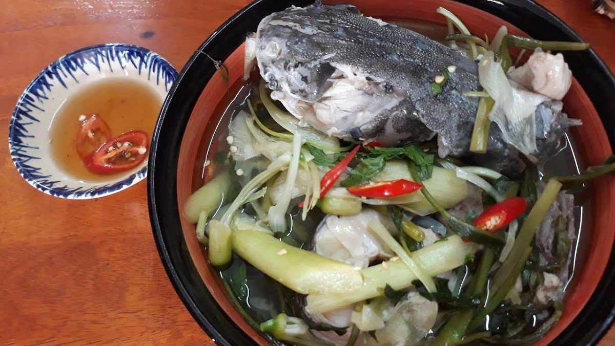 Sour fish soup with water spinach