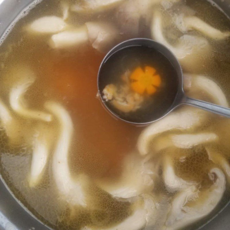 Step 3 Cook the soup Chive soup with tofu and mushrooms