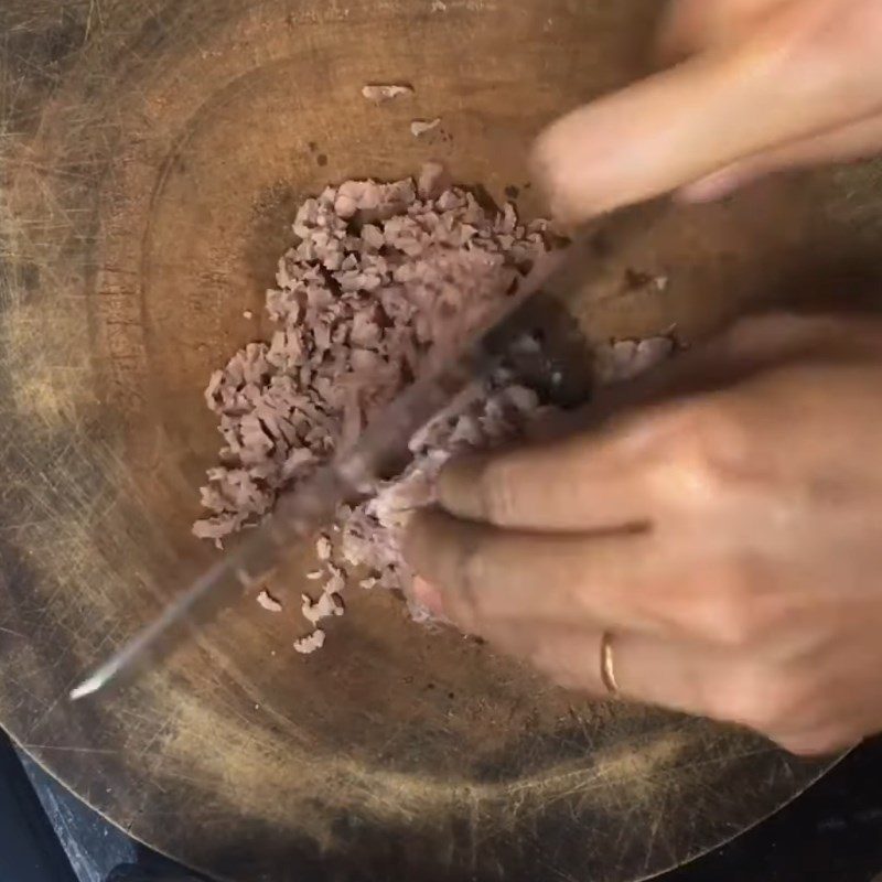 Step 4 Cut the beef into small pieces Beef porridge with water spinach for weaning