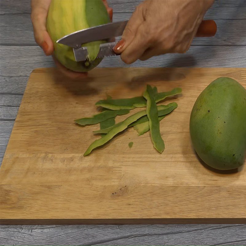 Step 1 Slice the mango Mango with chili salt and sugar