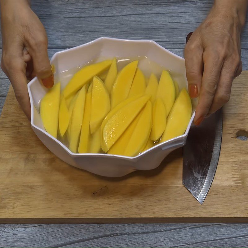 Step 1 Slice the mango Mango with chili salt and sugar