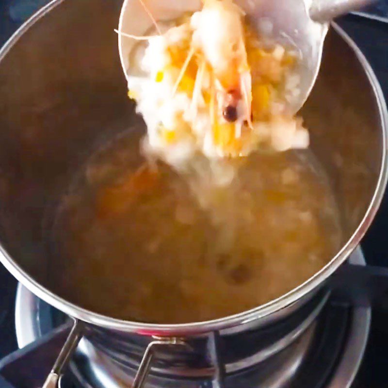 Step 3 Cook porridge Porridge with shrimp, potato, and carrot