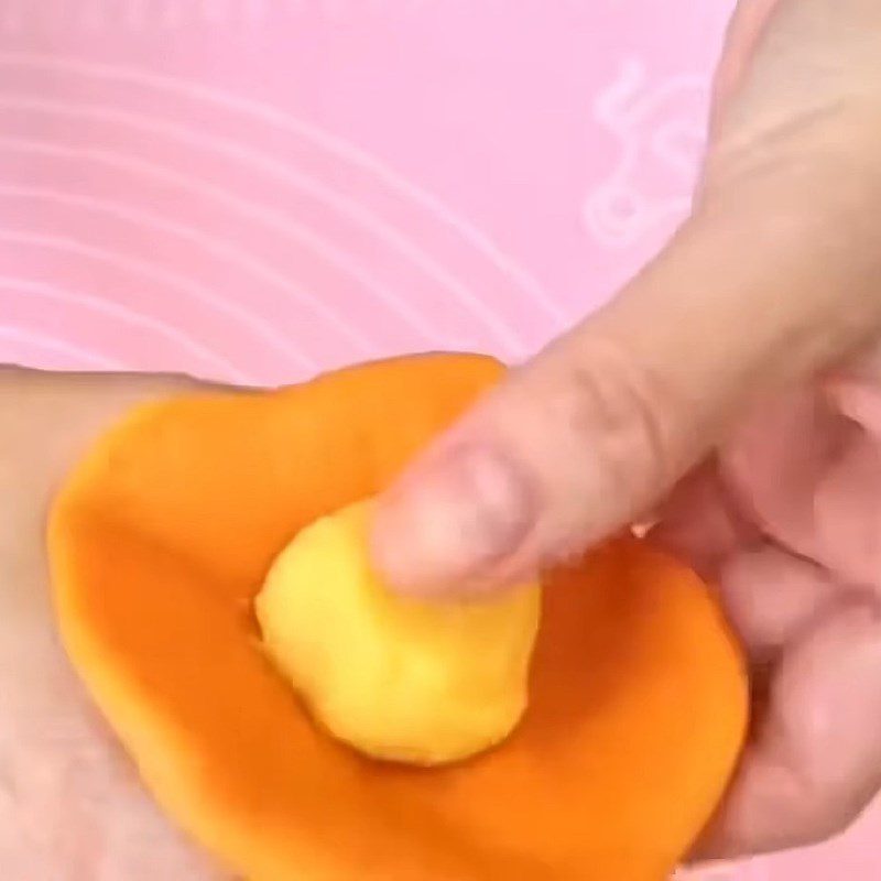 Step 5 Dividing the dough and wrapping the filling Orange bun