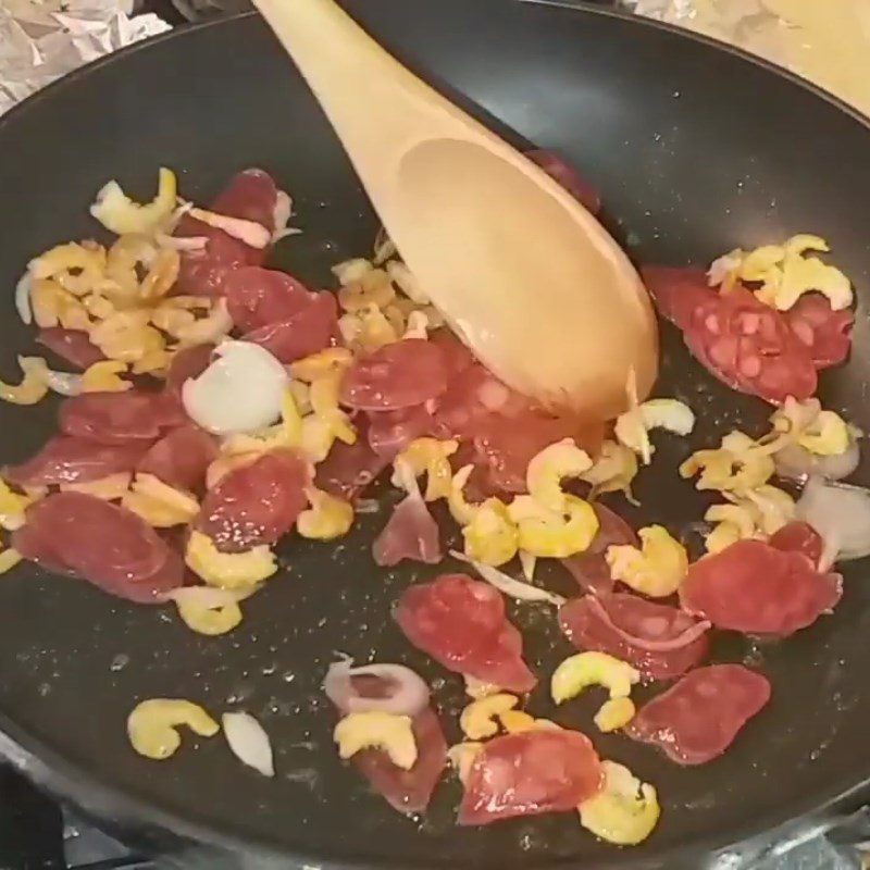 Step 2 Frying Sausage Fried Rice with Dried Shrimp