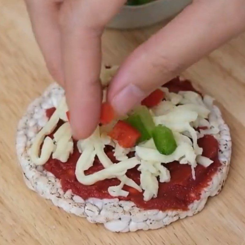 Step 2 Add the filling on the brown rice cake Mini brown rice pizza