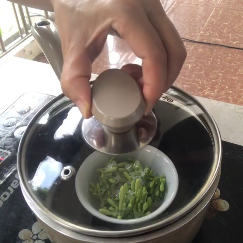 Step 2 Steam the papaya flowers Steamed Male Papaya Flowers with Rock Sugar