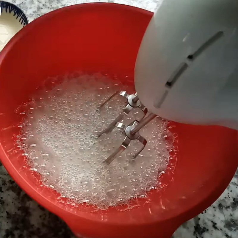 Step 1 Whip egg whites for Coconut Milk Sponge Cake