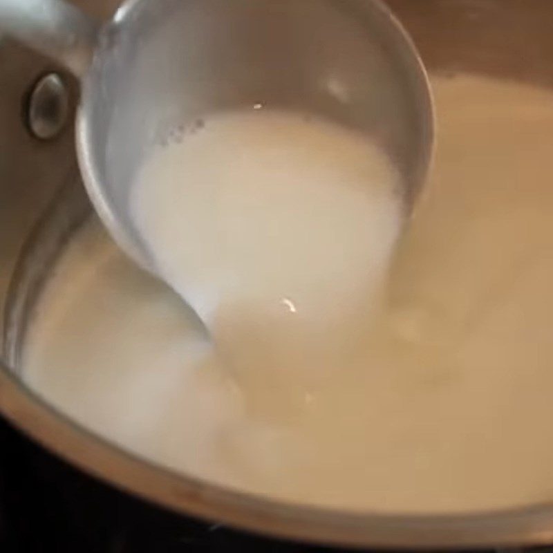 Step 1 Heat the coconut milk mixture Rice pudding - Coconut milk mango rice pudding