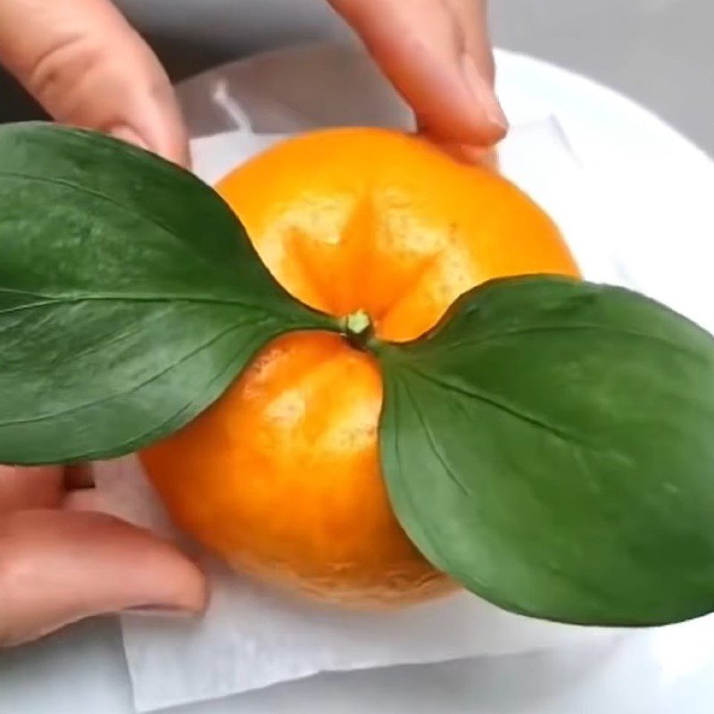 Step 7 Shaping the orange Orange-shaped steamed bun