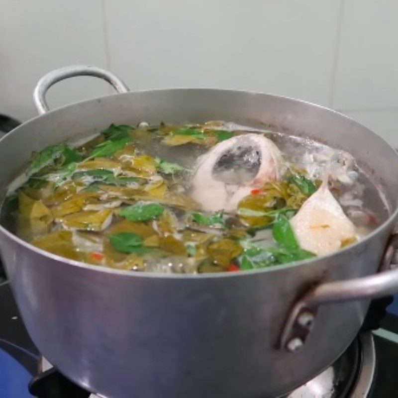 Step 5 Completion Sour fish cooked with giang leaves