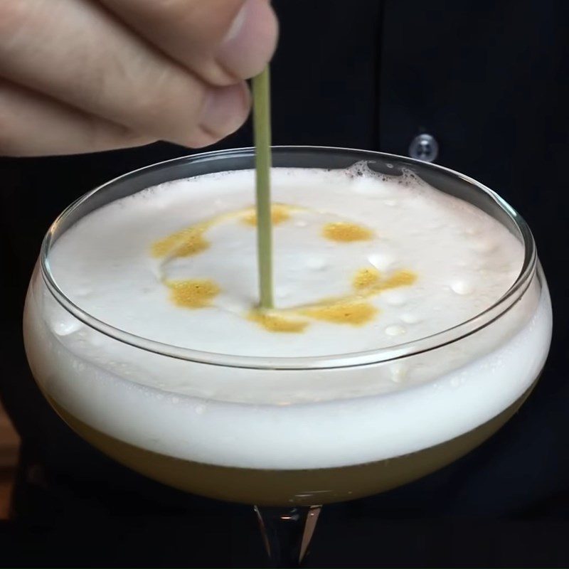 Step 2 Shake the cocktail with egg whites and decorate Whisky Sour Cocktail