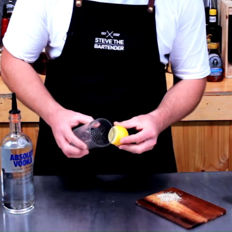 Step 1 Rim the glass with salt for Bloody Mary Cocktail