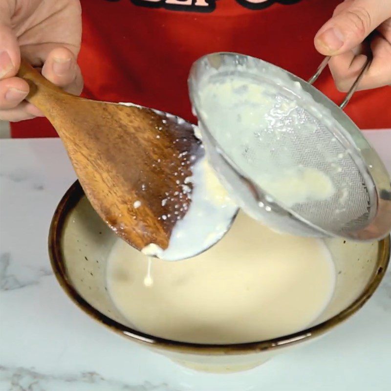 Step 3 Strain the milk mixture for cheese pudding