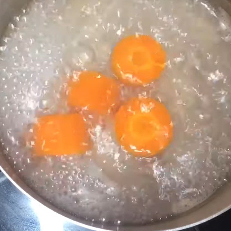 Step 2 Boil beef with carrots Beef porridge with water spinach for baby weaning