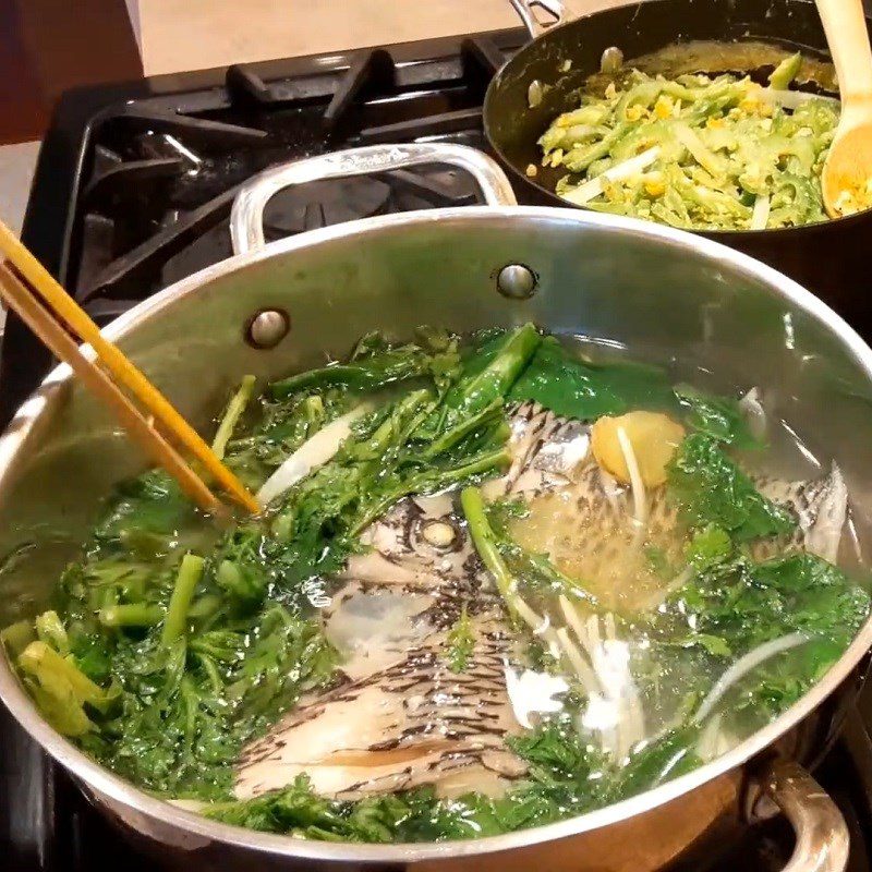 Step 3 Cooking frog fish soup with mustard greens Mustard greens soup cooked with frog fish