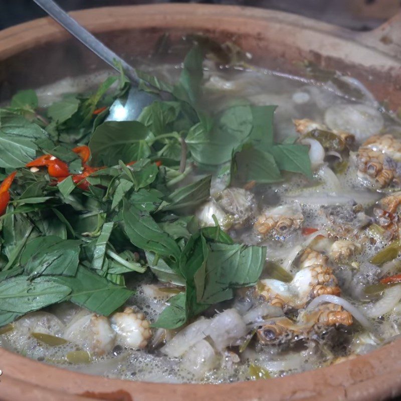 Step 4 Cooking sour crab soup with tamarind leaves