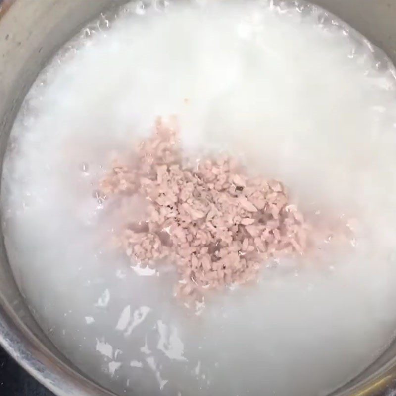 Step 3 Cook the porridge Pork meat tofu amaranth porridge