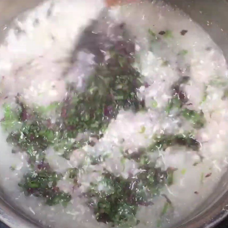 Step 3 Cook the porridge Pork meat tofu amaranth porridge