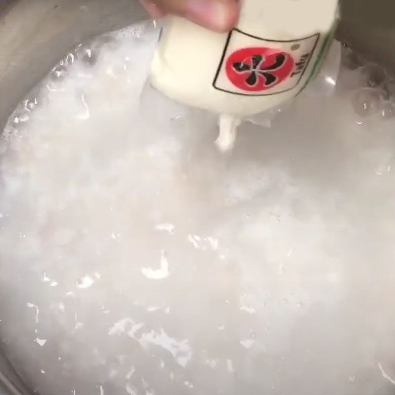 Step 3 Cook the porridge Pork meat tofu amaranth porridge