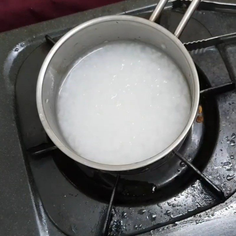 Step 3 Cooking porridge Snakehead fish carrot porridge