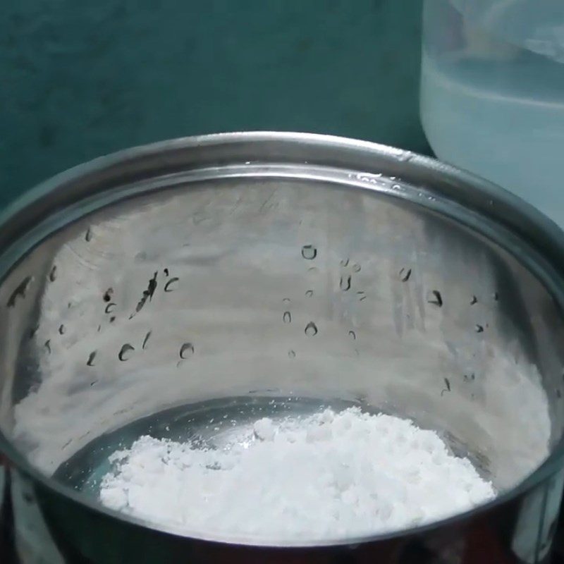 Step 6 Cook coconut milk for sweet noodle soup with butterfly pea flower