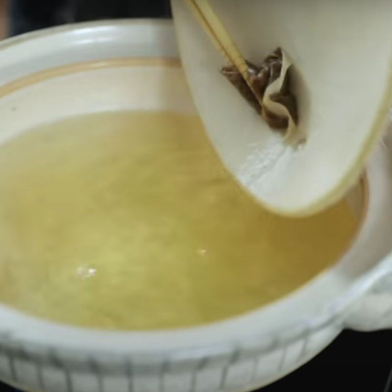 Step 2 Cook the chicken for Zosui Rice Soup