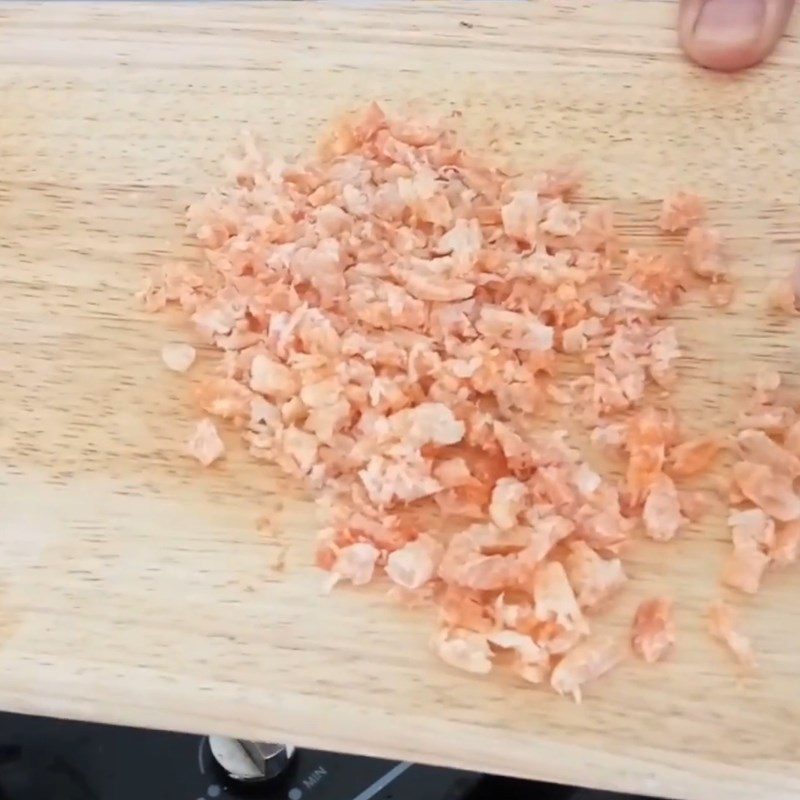 Step 1 Soak dried shrimp with plantain leaves soup