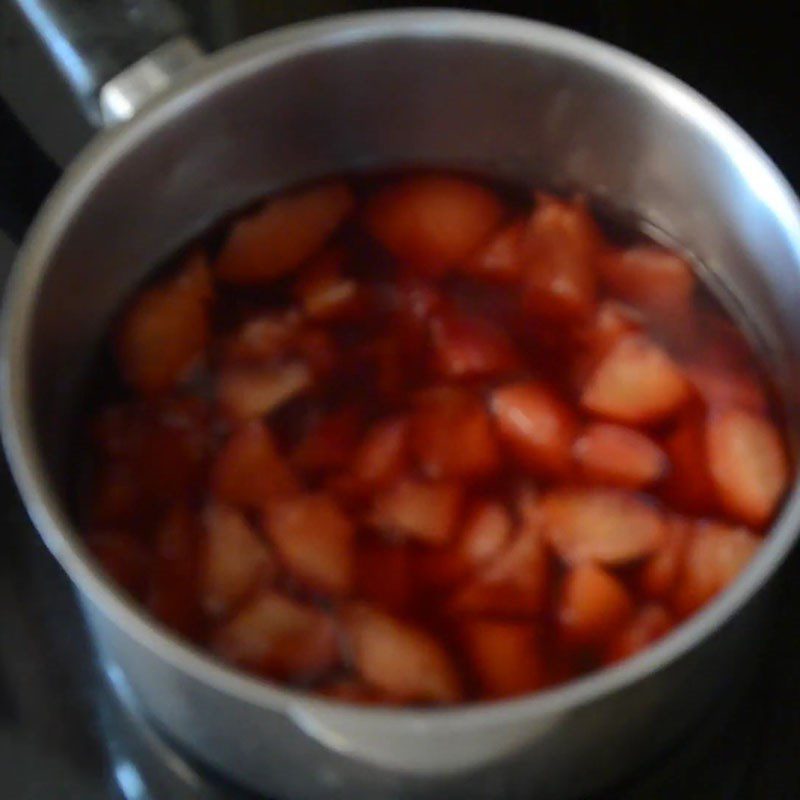 Step 2 Mash the plums Plum Punch